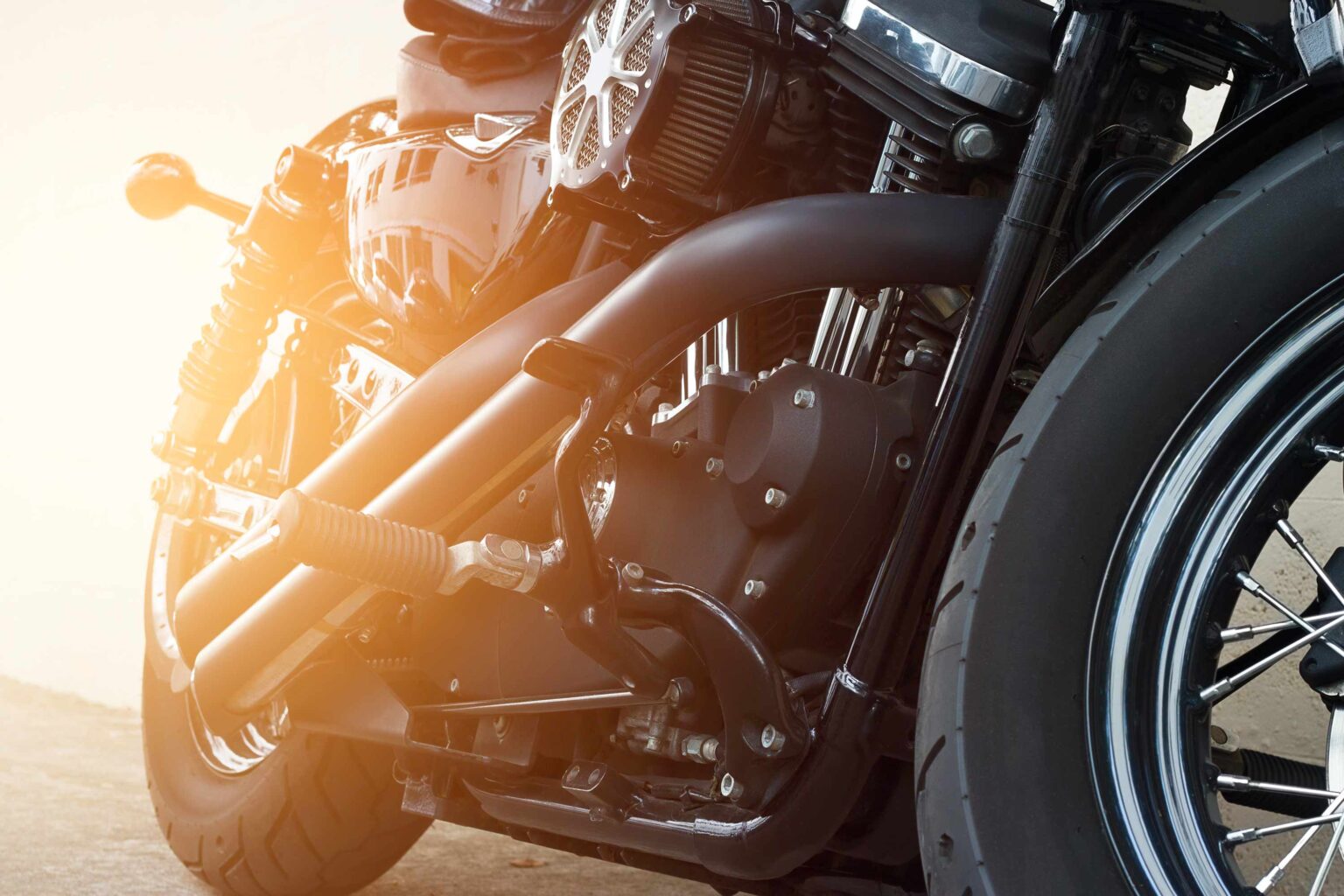 Close-up view of a modern motorcycle, highlighting the precision fasteners provided by Colombo Fasteners for the motorcycle industry, ensuring durability and performance.